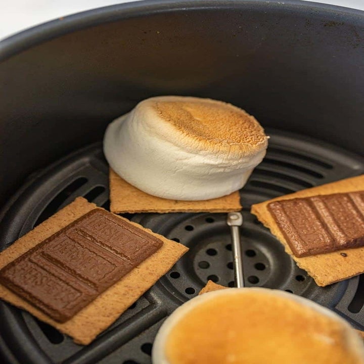 S'mores cooking in an air fryer.